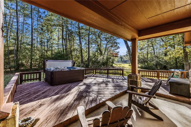 a view of a deck with trees
