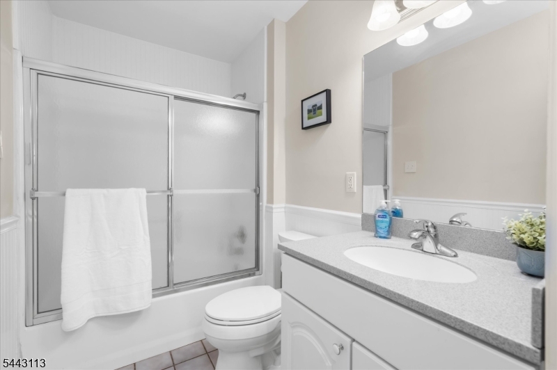 54 Rick Road Milford, NJ 08848 - Photo 18 of 50 a bathroom with a granite countertop sink toilet and shower