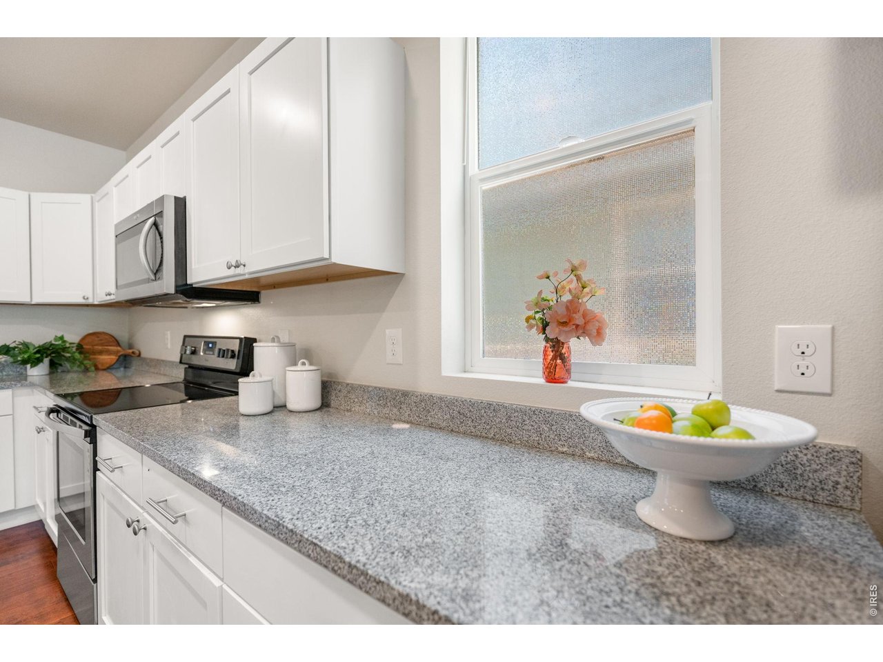 812 East Baseline Road, Unit B Lafayette, CO 80026 - Photo 13 of 44 Granite countertops appear to be never ending for plenty of prep and entertaining!