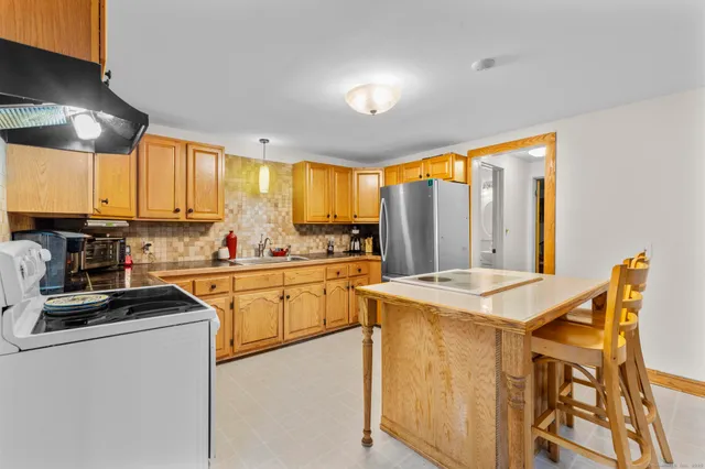 a bathroom with a shower and a toilet