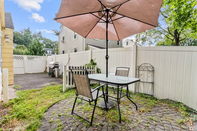 a table and chairs in the patio