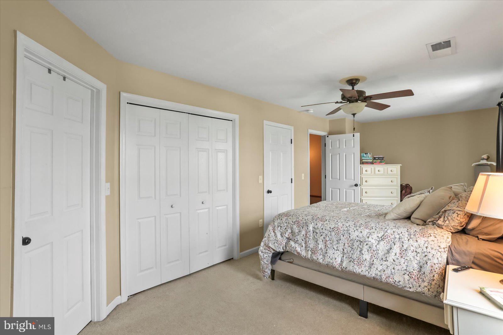 14 Galaxy Drive Hanover, PA 17331 - Photo 14 of 38 a bedroom with a bed and a chandelier