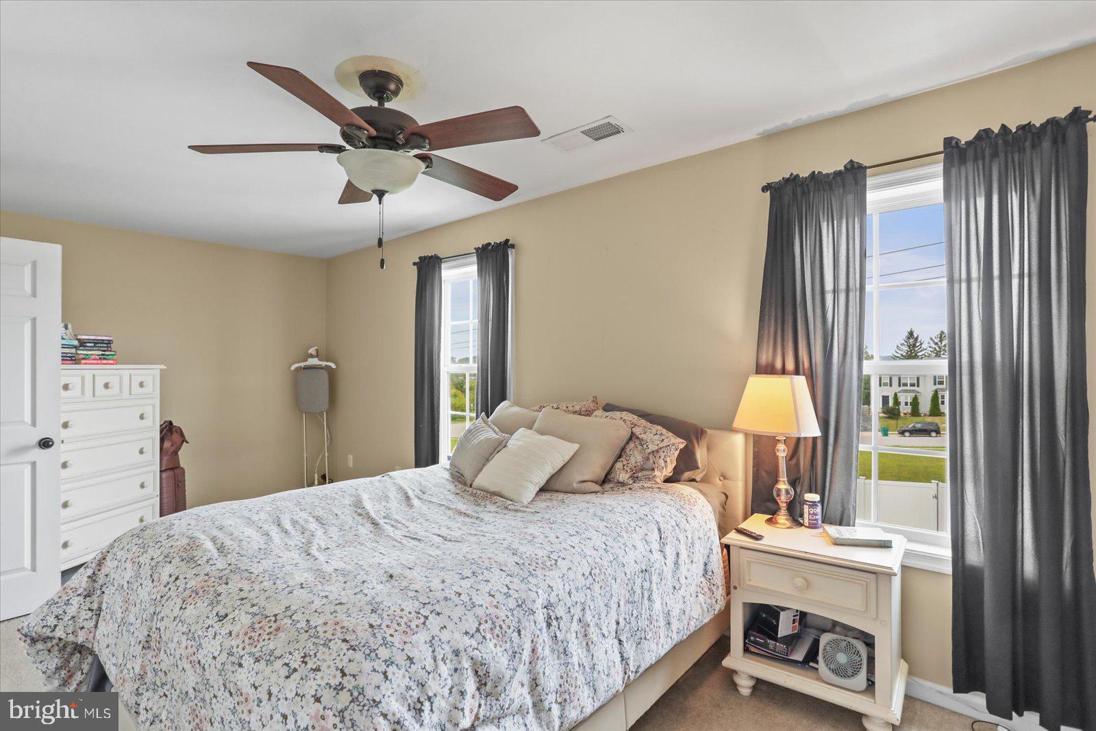 14 Galaxy Drive Hanover, PA 17331 - Photo 15 of 38 a bedroom with a bed and a chandelier