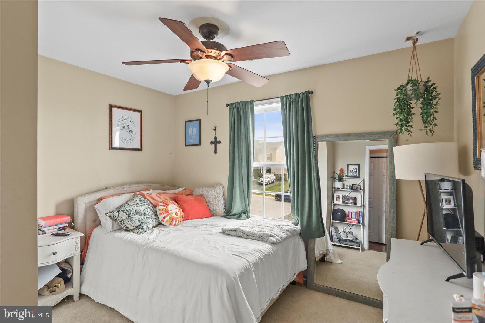 14 Galaxy Drive Hanover, PA 17331 - Photo 17 of 38 a bedroom with a bed and a chandelier
