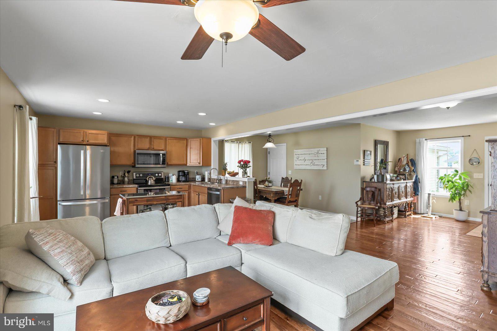 14 Galaxy Drive Hanover, PA 17331 - Photo 4 of 38 a living room with furniture kitchen view and a wooden floor