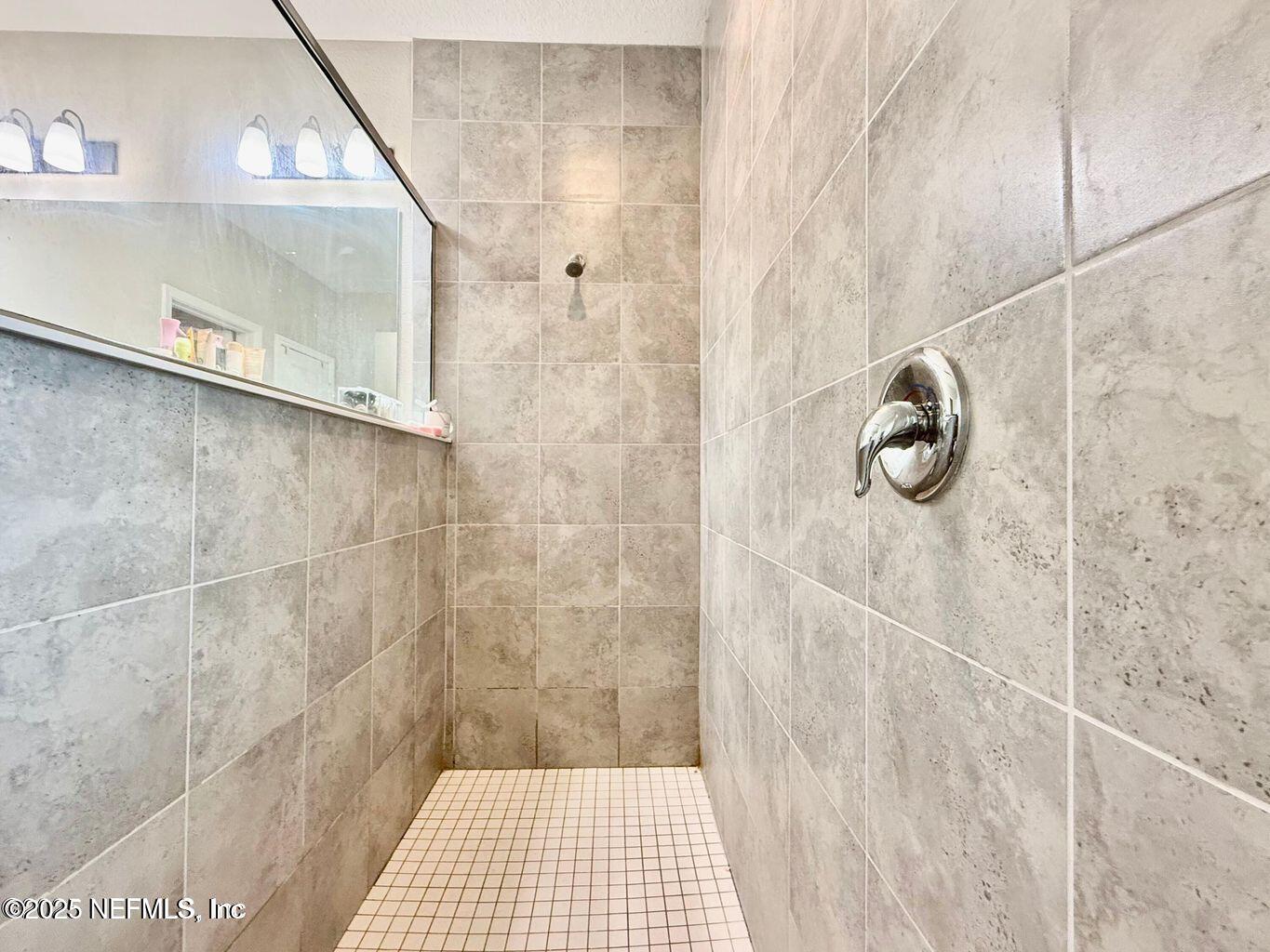 195 Torres Street St. Augustine, FL 32095 - Photo 15 of 22 a bathroom with a shower