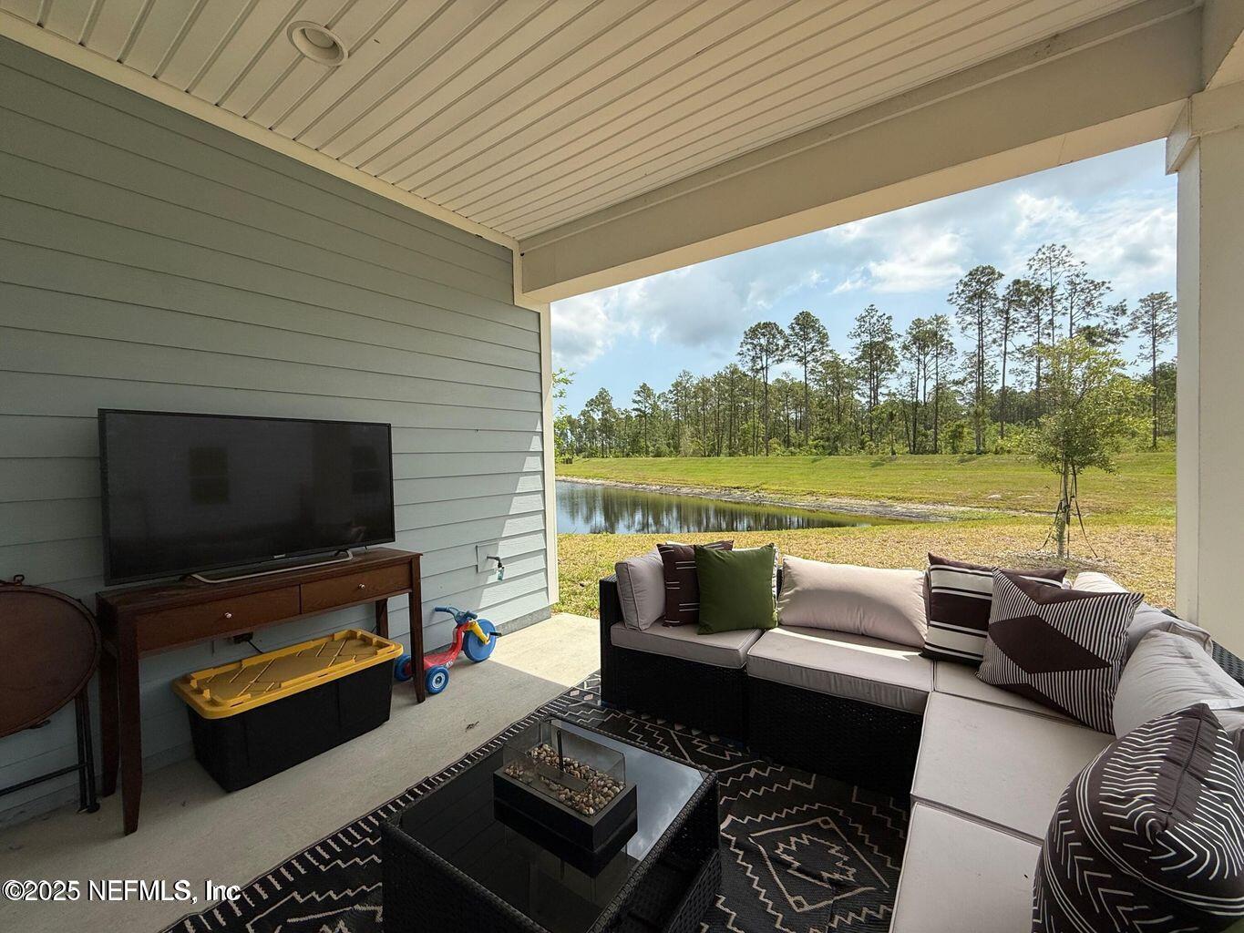 195 Torres Street St. Augustine, FL 32095 - Photo 18 of 22 a outdoor living space with furniture and garden view