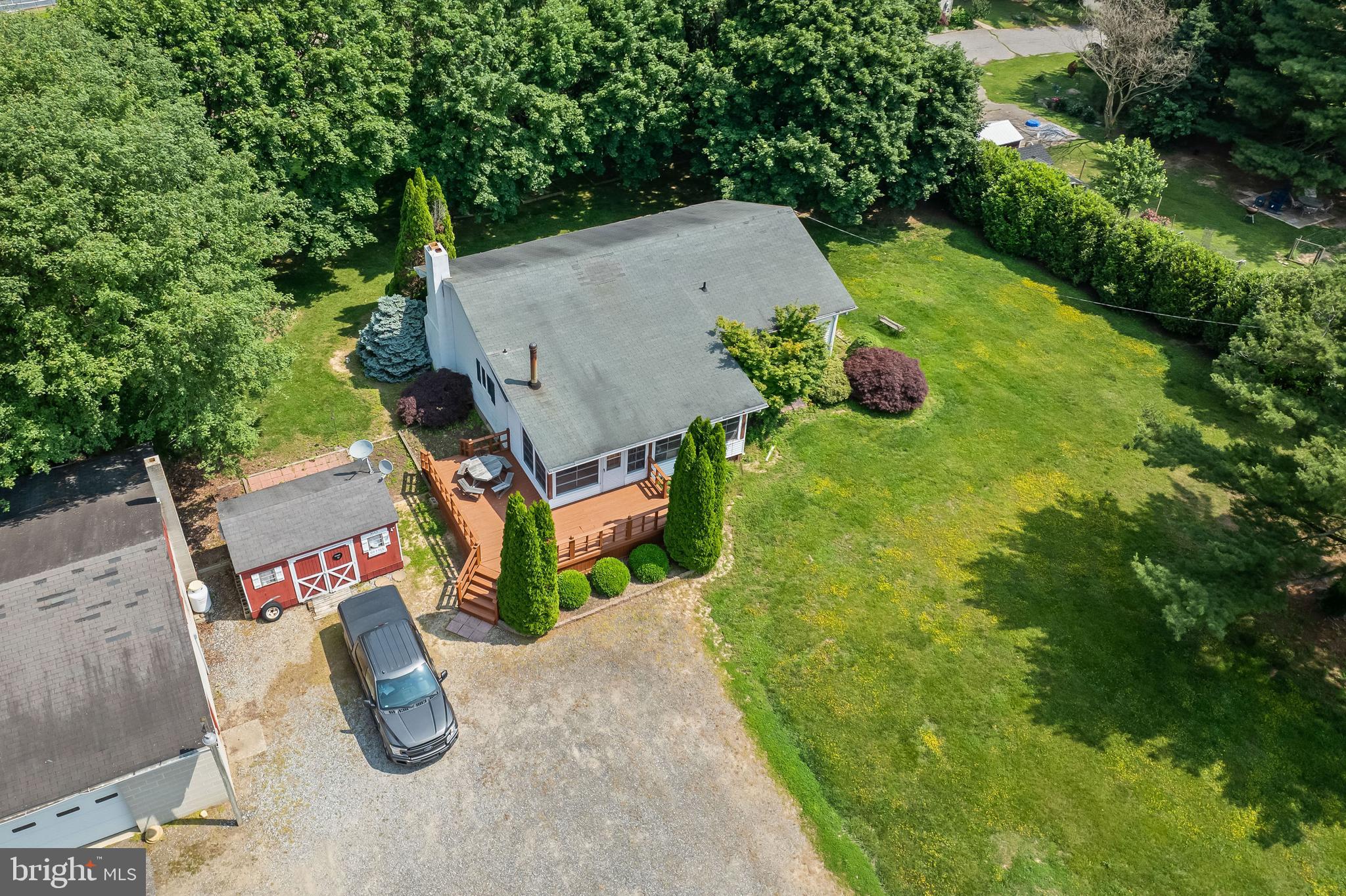 360 Harmony Road Bridgeton, NJ 08302 - Photo 7 of 23 an aerial view of a pool with garden
