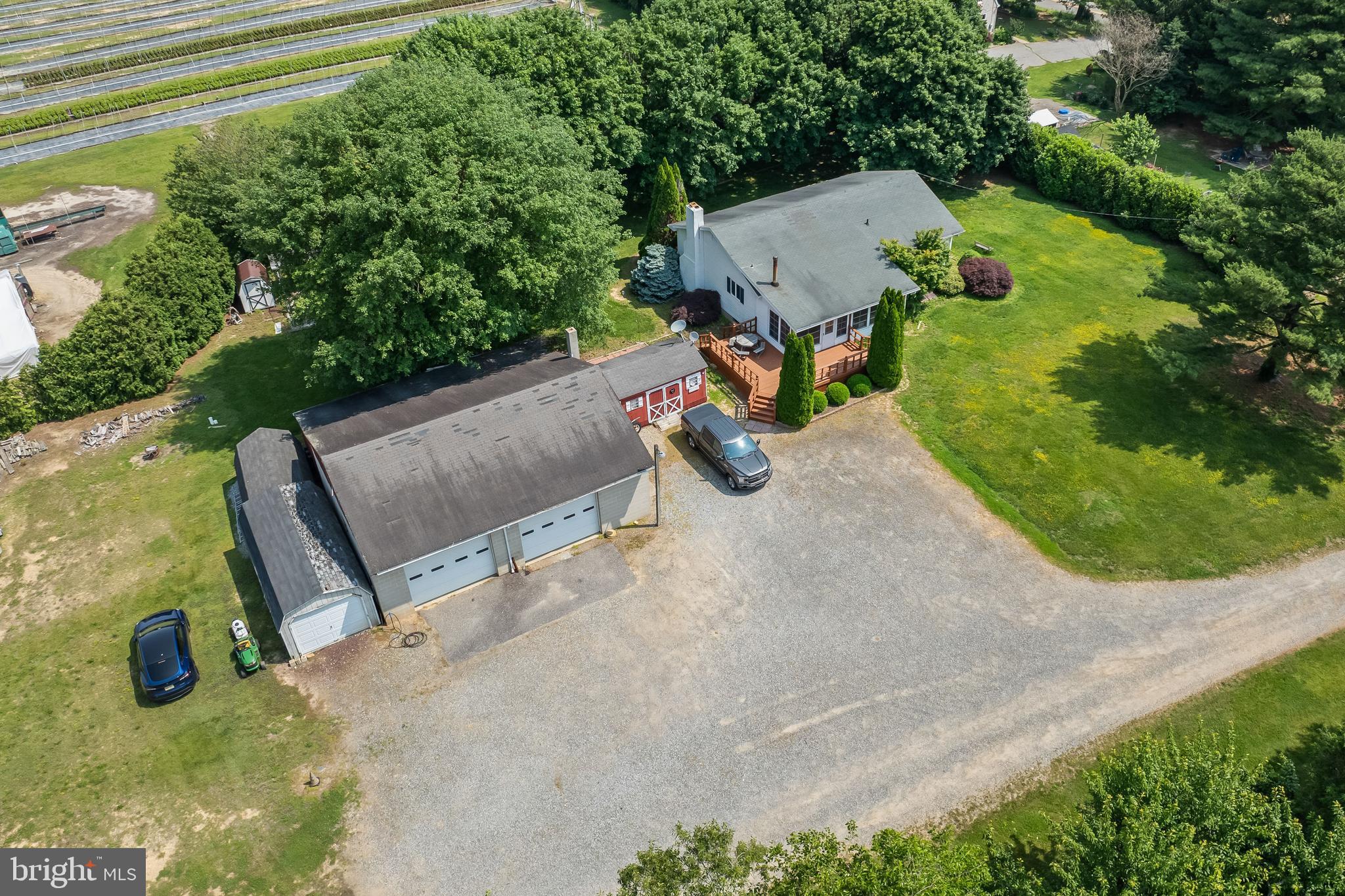 360 Harmony Road Bridgeton, NJ 08302 - Photo 9 of 23 an aerial view of a house with swimming pool and garden