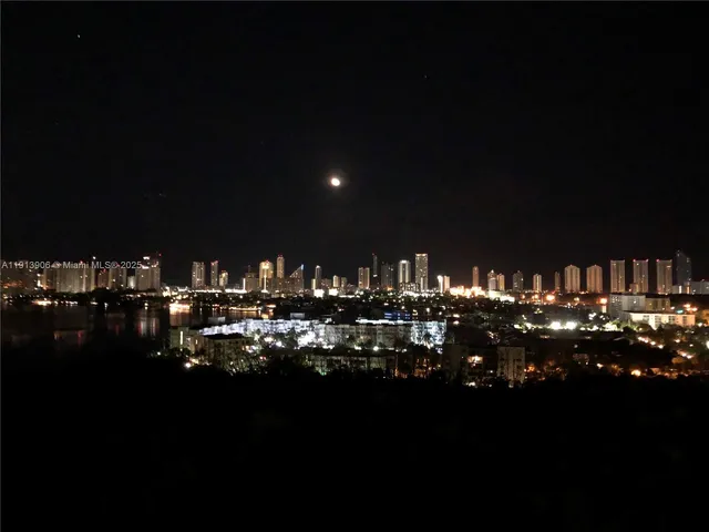 a view of swimming pool from a balcony