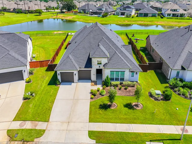 a view of a house with a swimming pool