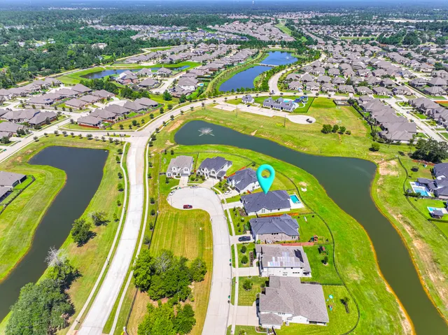 an aerial view of a swimming pool