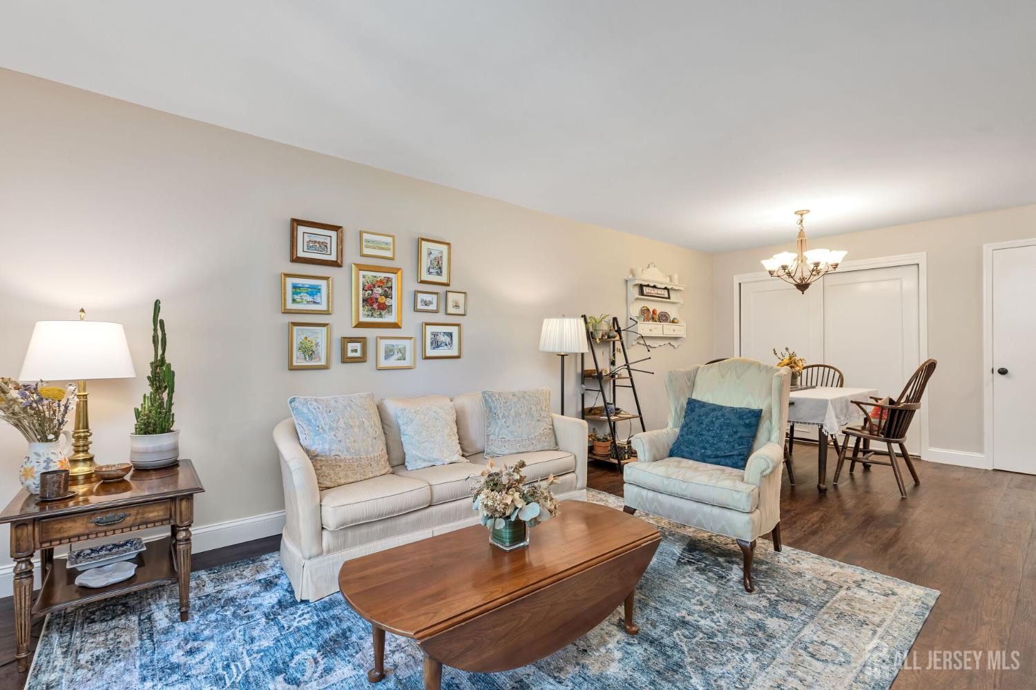 29 Tansy Court Bedminster, NJ 07921 - Photo 2 of 11 a living room with furniture and wooden floor
