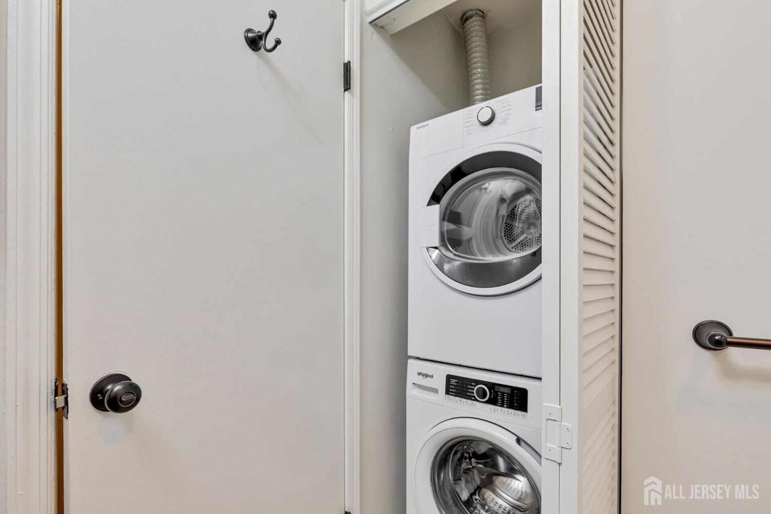 29 Tansy Court Bedminster, NJ 07921 - Photo 7 of 11 a utility room with dryer and washer