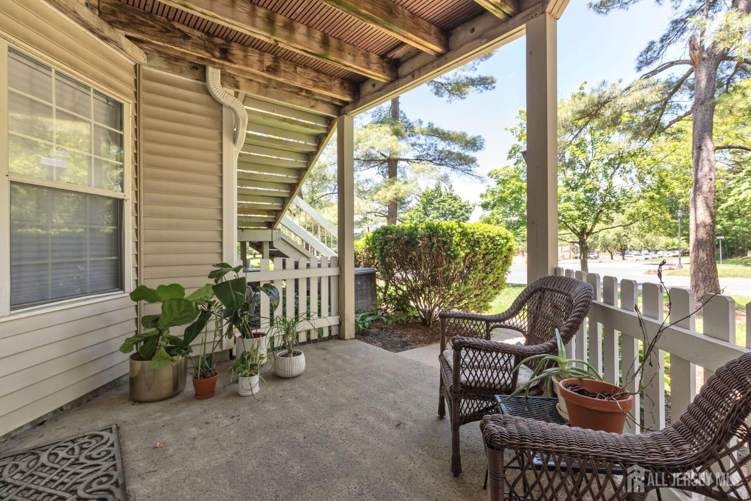 29 Tansy Court Bedminster, NJ 07921 - Photo 9 of 11 a view of a chairs and table in the patio