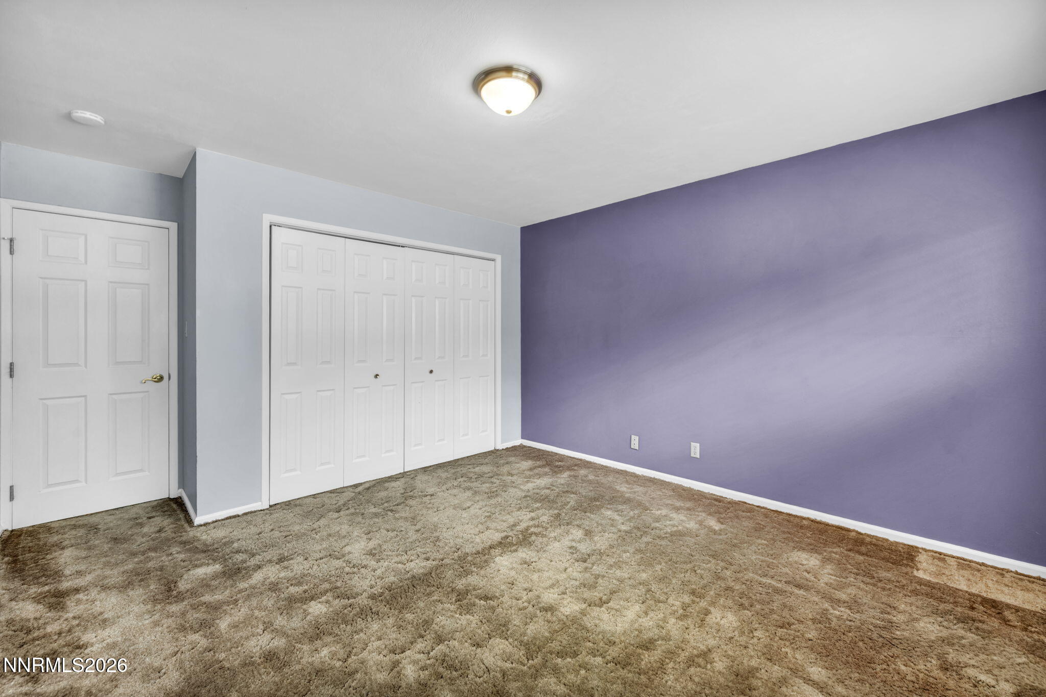 14190 Rim Rock Drive Reno, NV 89521 - Photo 41 of 68 an empty room with a fan