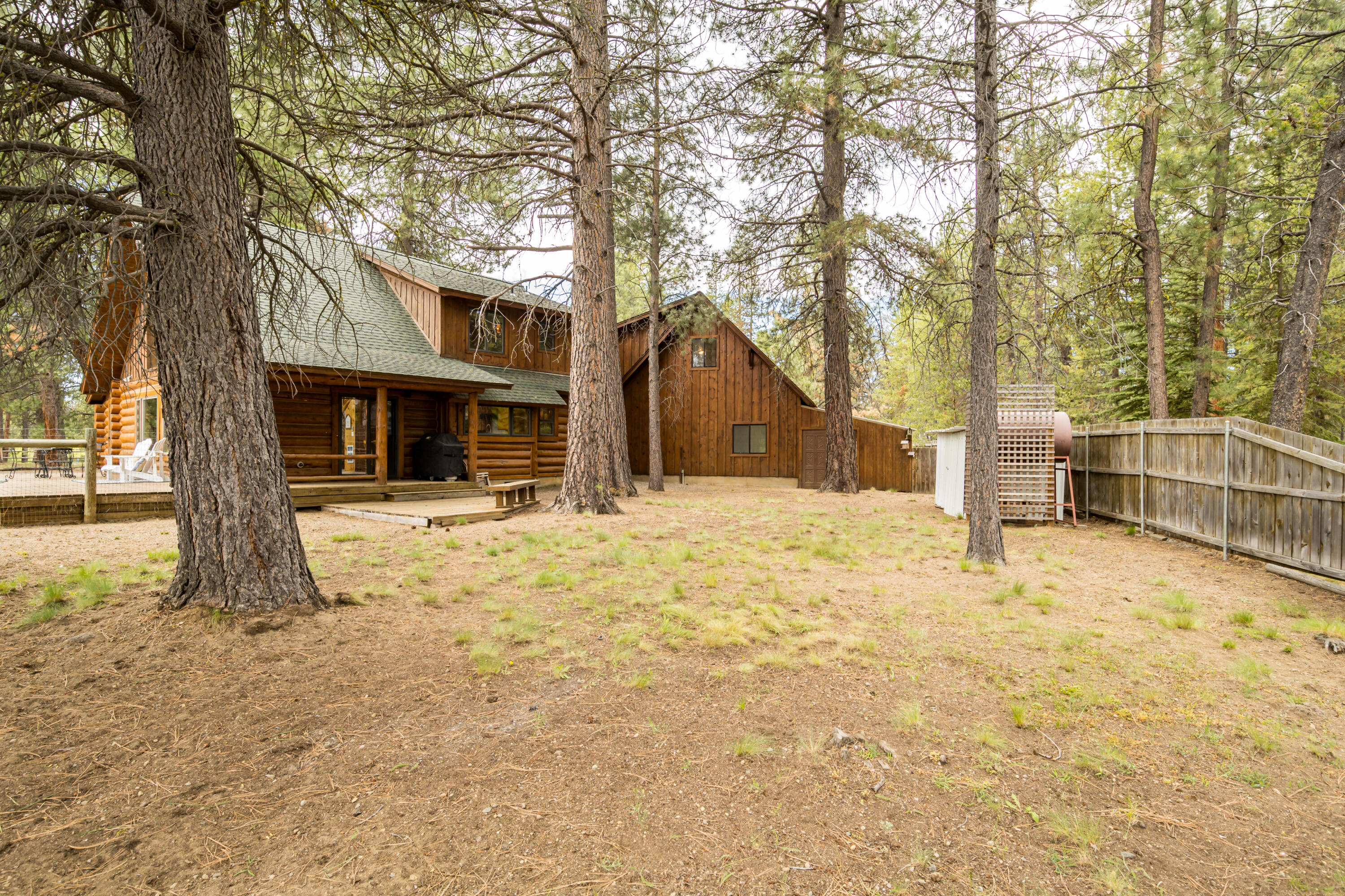 17026 Sharp Drive Bend, OR 97707 - Photo 60 of 72 a white house that has tree in front of it