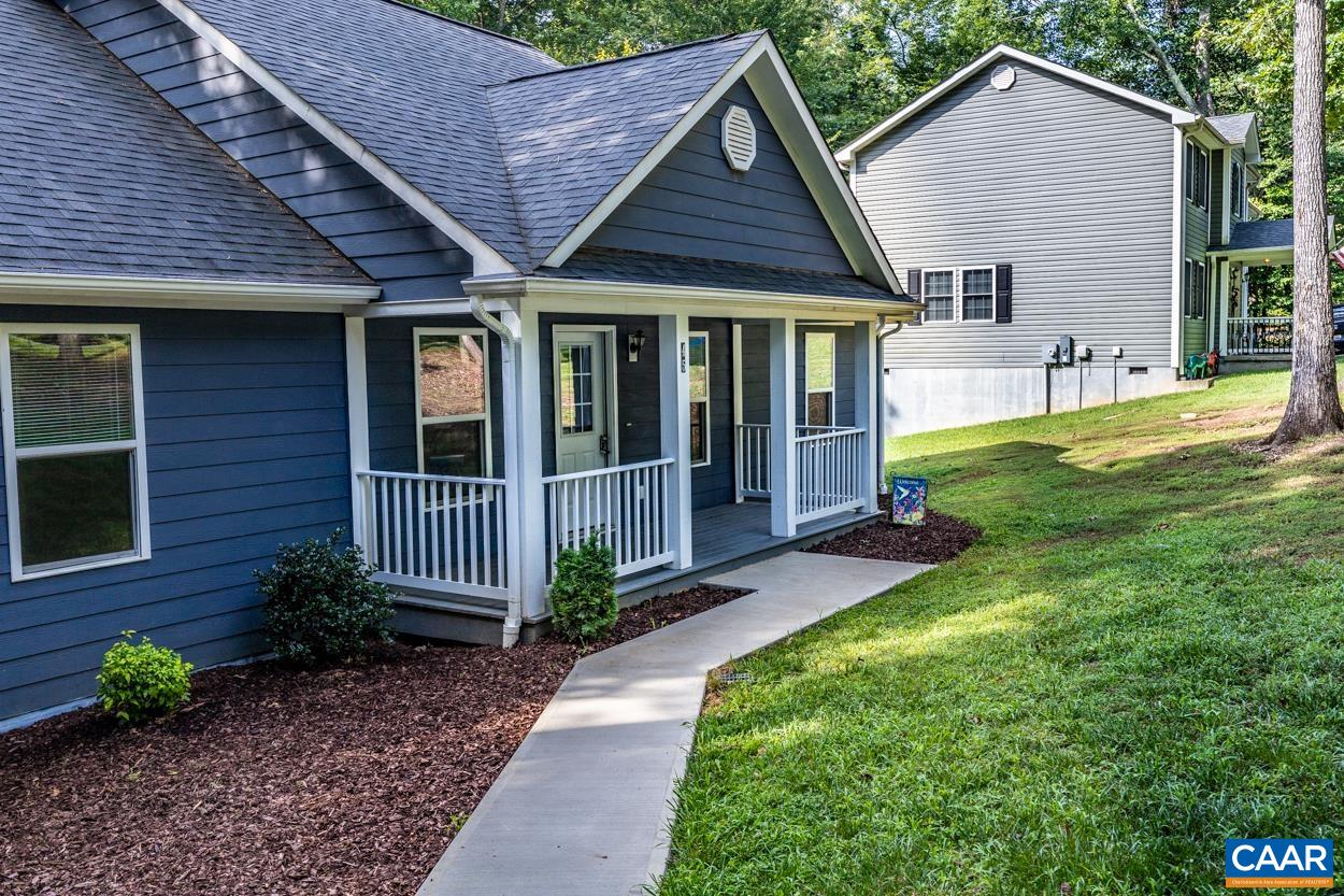 45 East Point Road Palmyra, VA 22963 - Photo 15 of 55 a front view of a house with garden