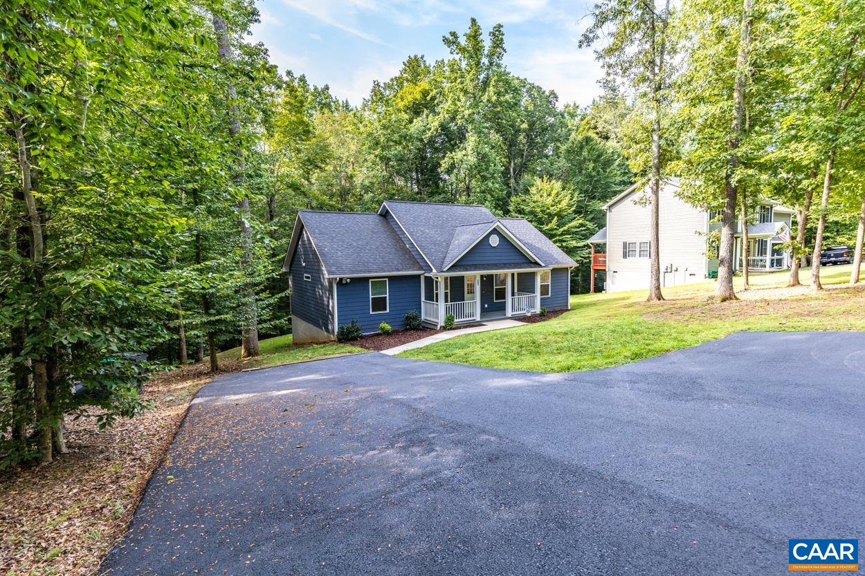 45 East Point Road Palmyra, VA 22963 - Photo 19 of 55 a view of a house with a yard and large trees