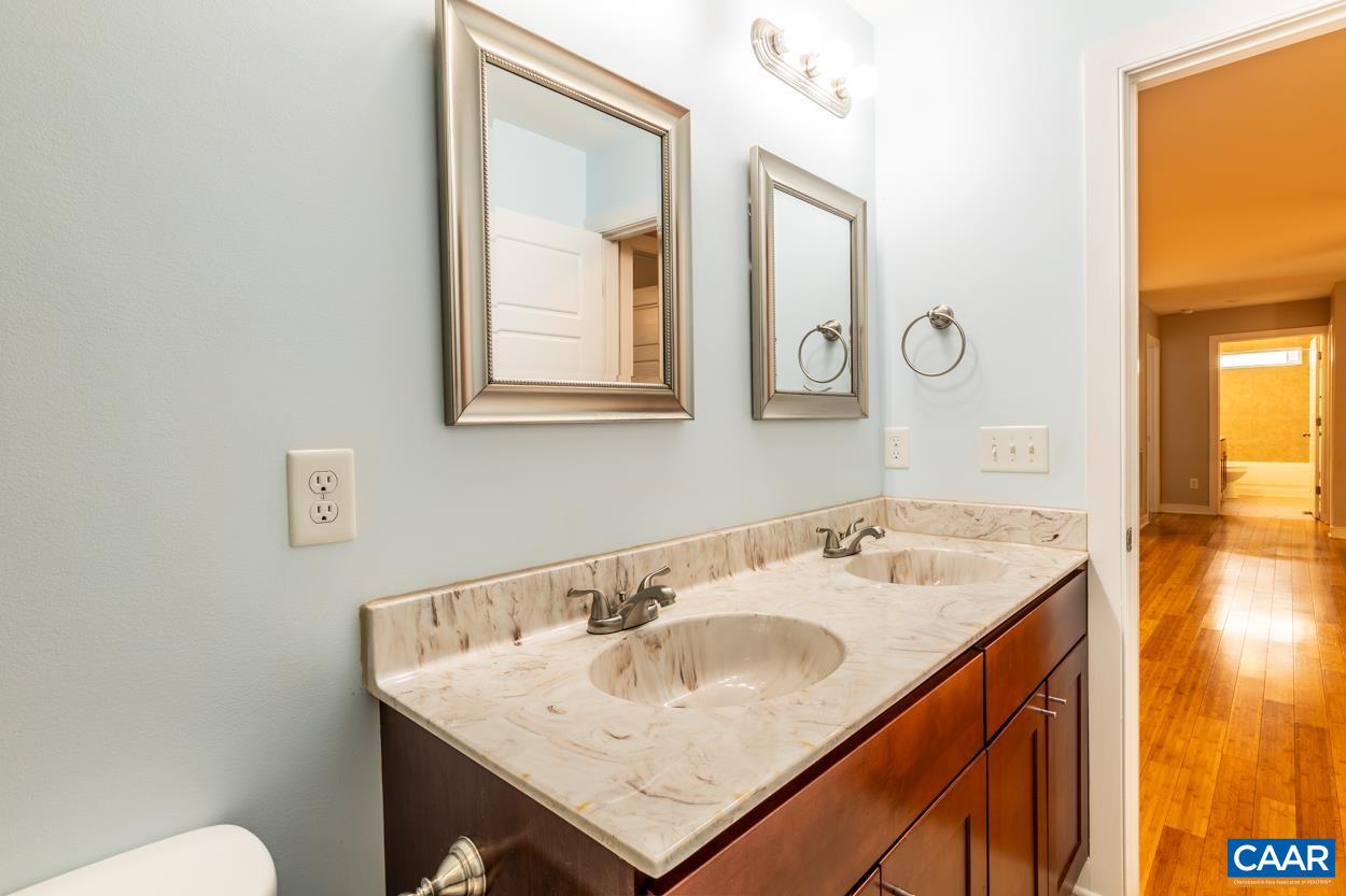 45 East Point Road Palmyra, VA 22963 - Photo 40 of 55 a bathroom with a sink and a mirror