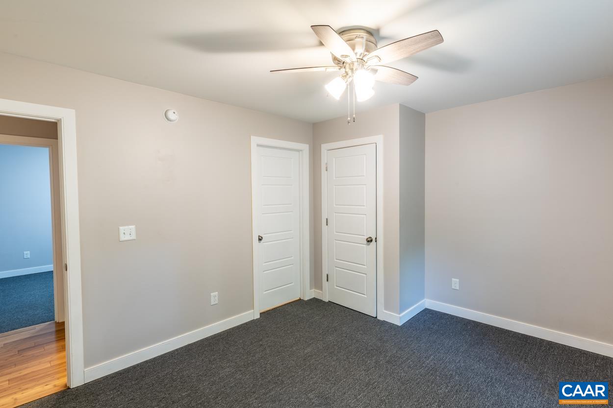45 East Point Road Palmyra, VA 22963 - Photo 46 of 55 an empty room with windows and fan