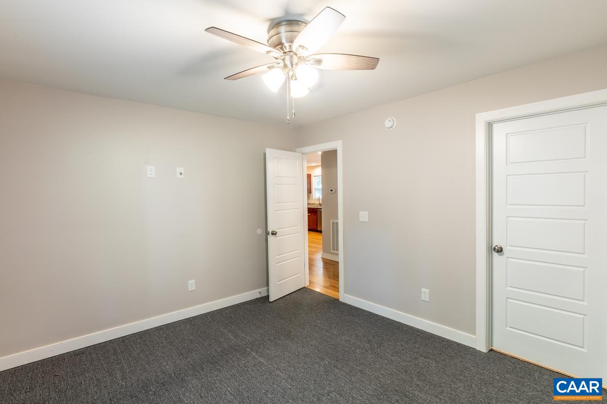 45 East Point Road Palmyra, VA 22963 - Photo 47 of 55 an empty room with closet and a ceiling fan