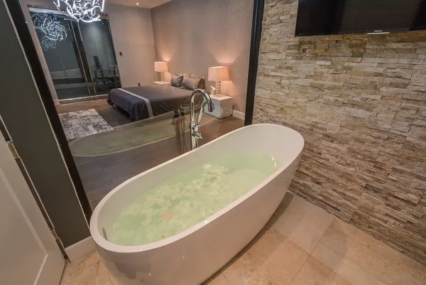 a bath tub sitting in a bathroom