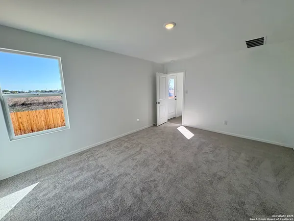 an empty room with a window