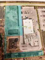 a bathroom with a glass shower door and a window