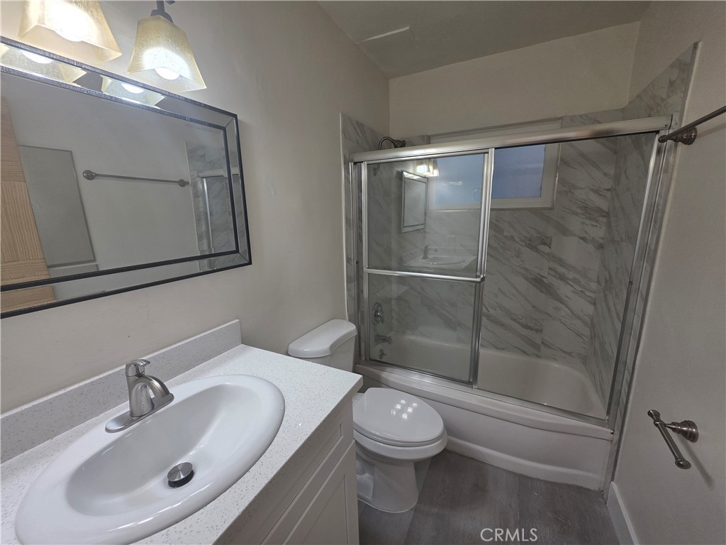4436 Ventura Canyon Avenue Sherman Oaks, CA 91423 - Photo 10 of 13 a bathroom with a sink toilet and shower
