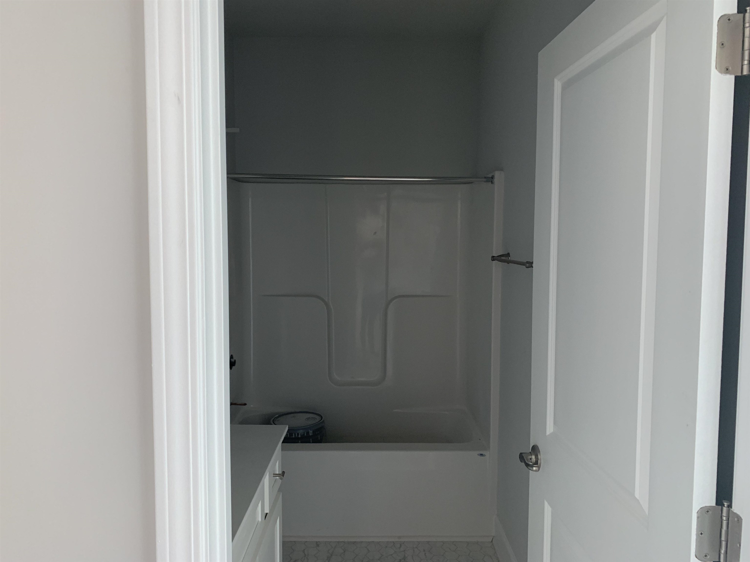 8566 Shallow Crk Trail Bailey, NC 27807 - Photo 13 of 20 a bathroom with a glass shower door