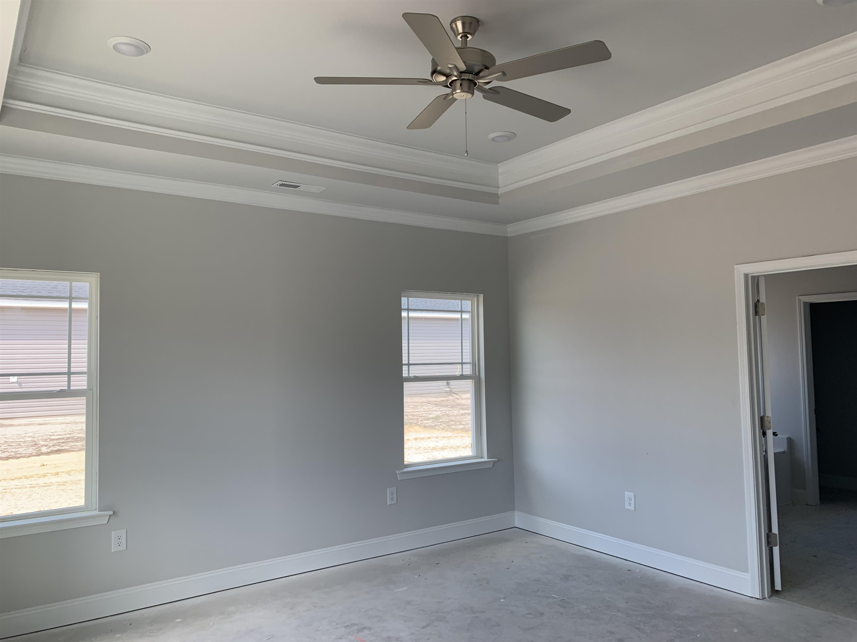 8566 Shallow Crk Trail Bailey, NC 27807 - Photo 15 of 20 a view of a livingroom with a window and a ceiling fan