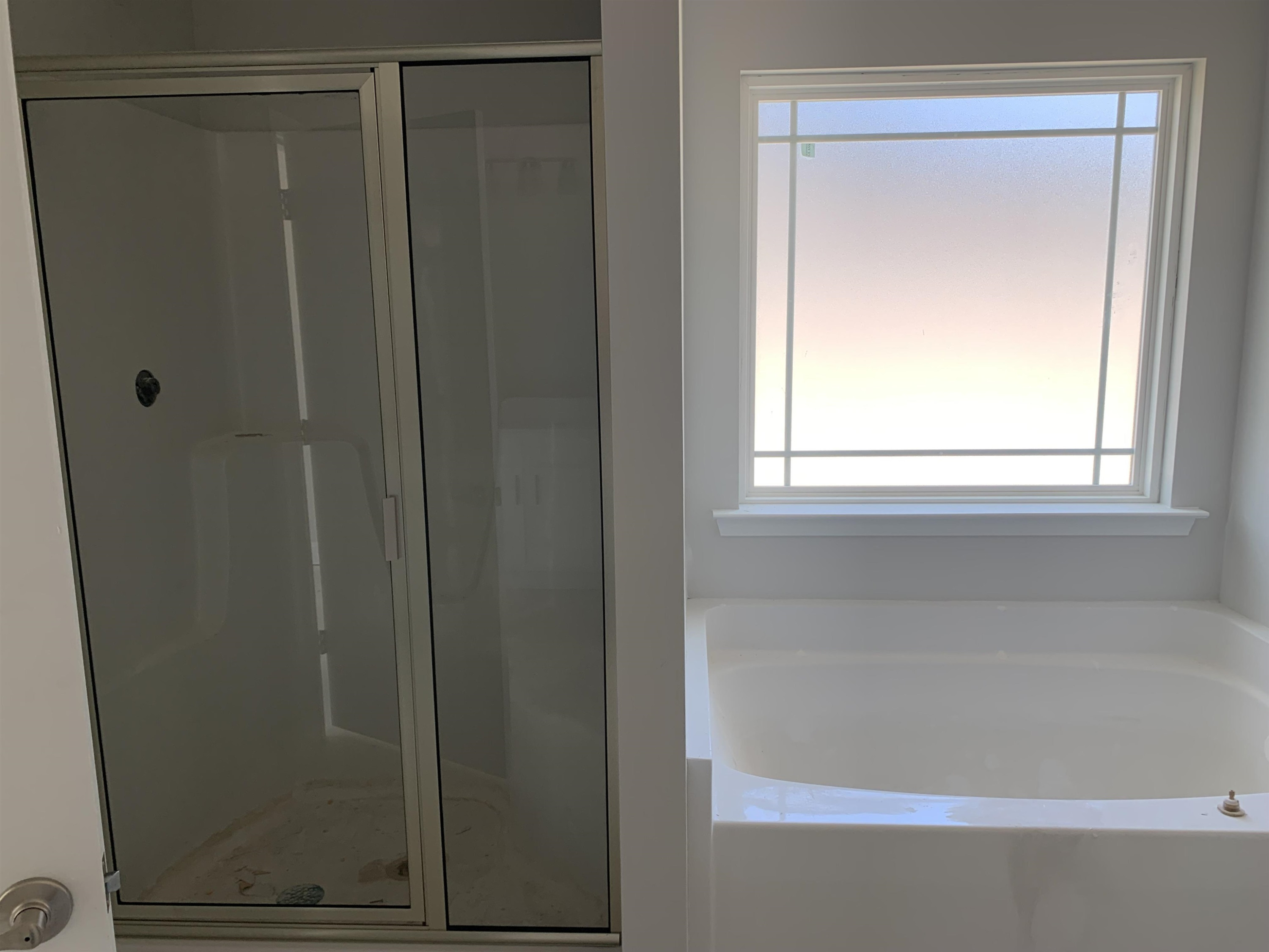 8566 Shallow Crk Trail Bailey, NC 27807 - Photo 17 of 20 a bathroom with a glass shower door