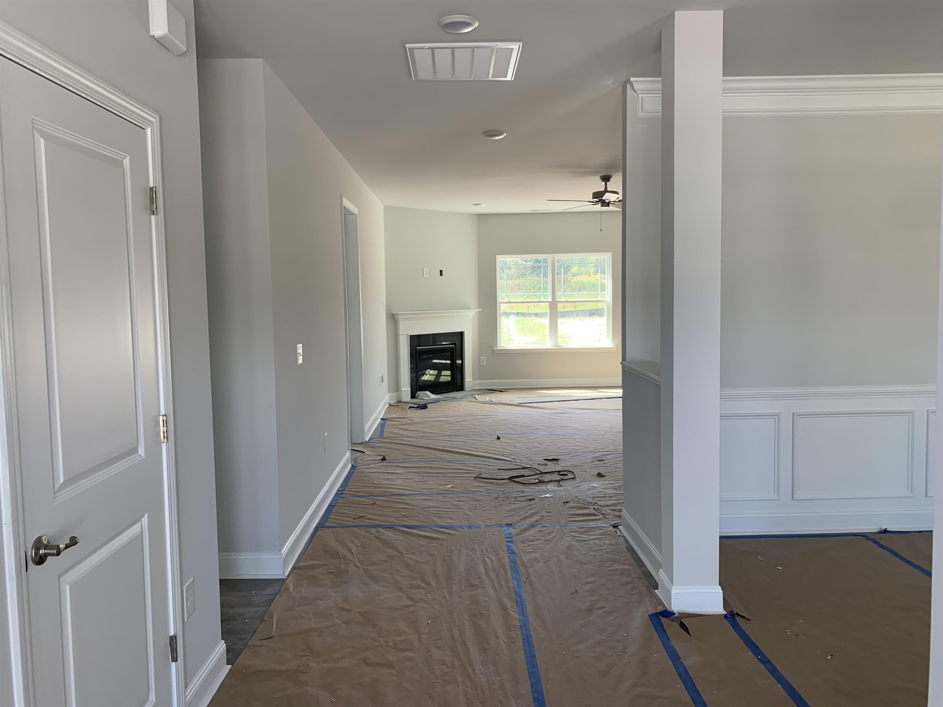 8566 Shallow Crk Trail Bailey, NC 27807 - Photo 4 of 20 a view of hallway with livingroom and a window