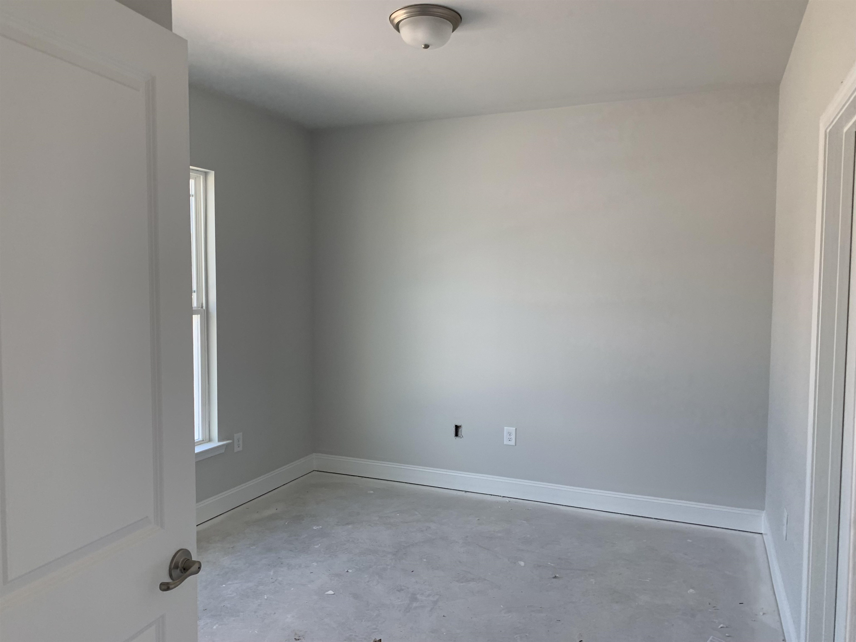 8566 Shallow Crk Trail Bailey, NC 27807 - Photo 5 of 20 an empty room with a window