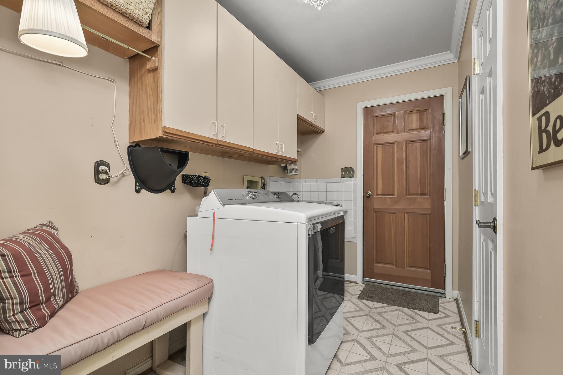 4530 Ten Oaks Road Dayton, MD 21036 - Photo 18 of 49 First floor laundry w/access to rear deck