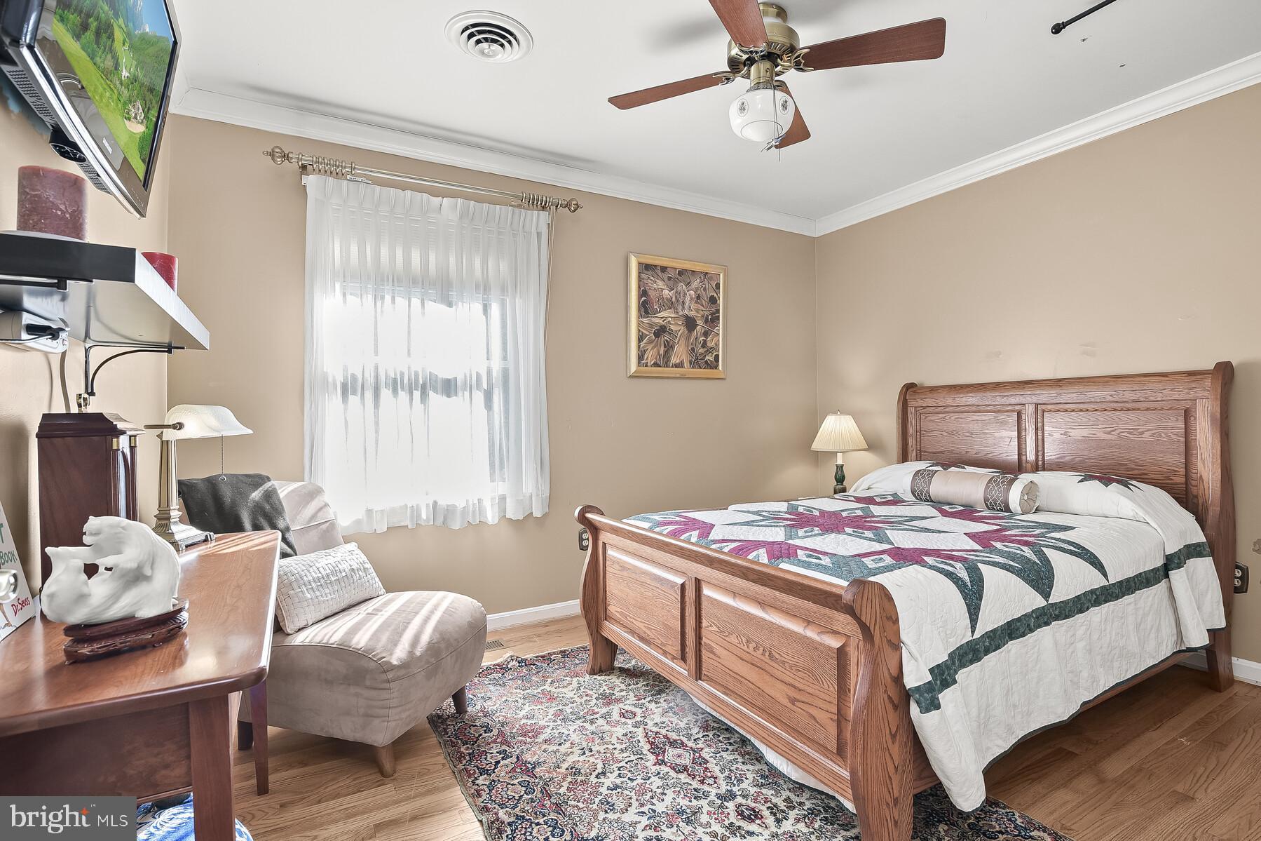 4530 Ten Oaks Road Dayton, MD 21036 - Photo 30 of 49 Third bedroom with wood floors and ceiling fan