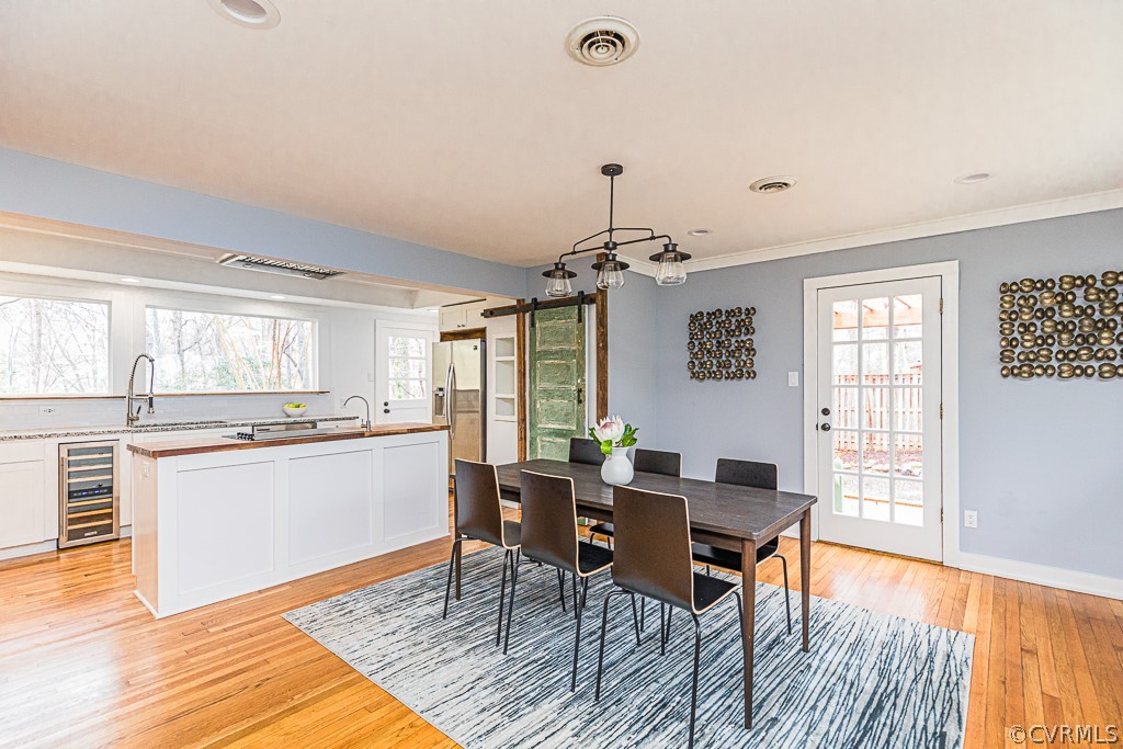 4004 Oakleaf Road Richmond, VA 23235 - Photo 14 of 47 a kitchen with granite countertop breakfast area and windows