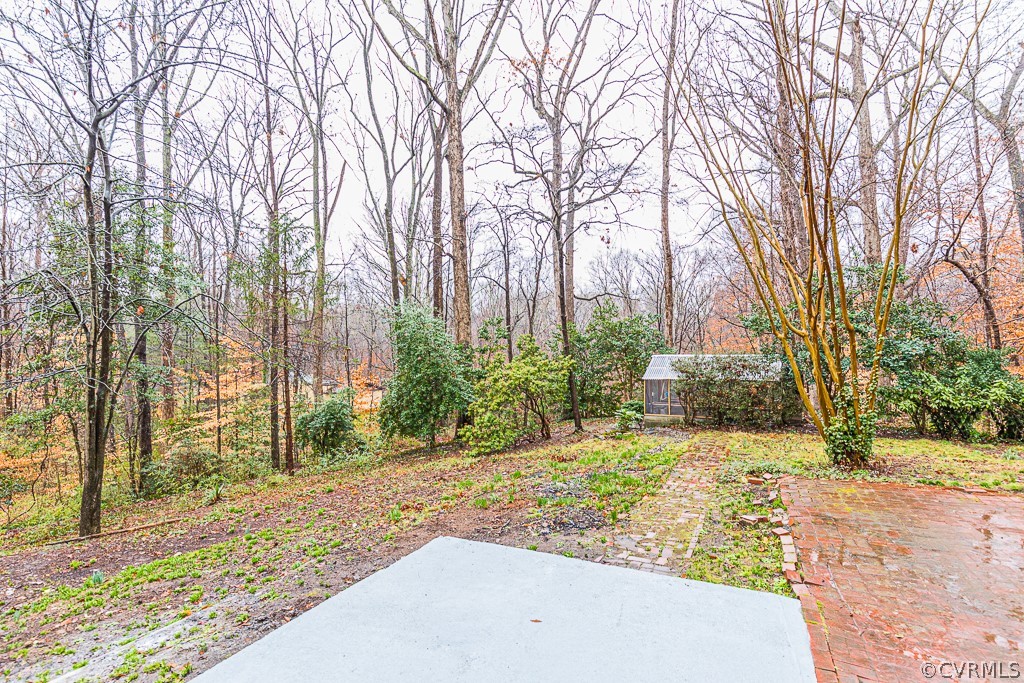 4004 Oakleaf Road Richmond, VA 23235 - Photo 41 of 47 a view of a yard with trees
