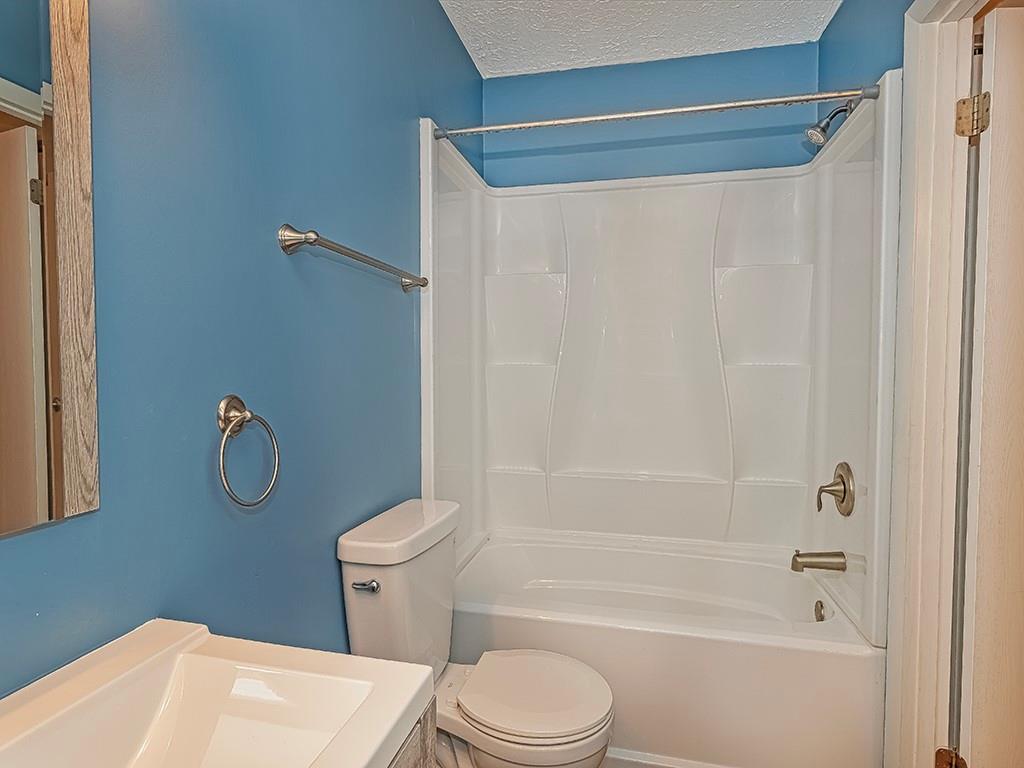 120 Forest Drive Seven Fields, PA 16046 - Photo 21 of 24 a bathroom with a toilet and a shower