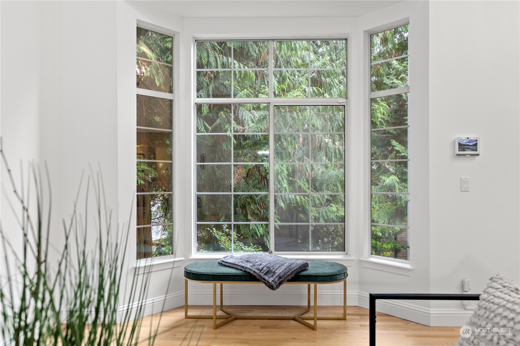 10411 Northeast 152nd Place Bothell, WA 98011 - Photo 16 of 38 a living room filed with furniture and a window