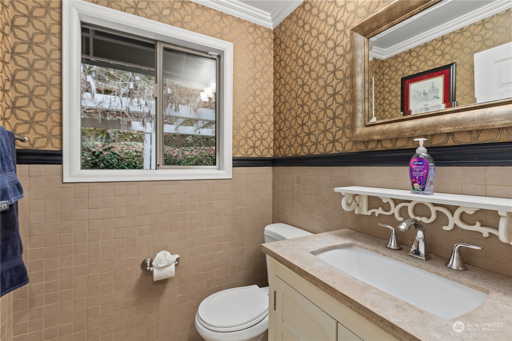 10411 Northeast 152nd Place Bothell, WA 98011 - Photo 18 of 38 a bathroom with a toilet sink and mirror