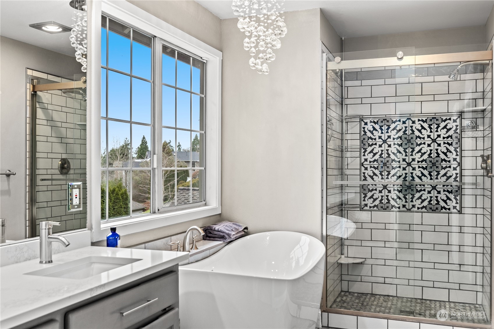 10411 Northeast 152nd Place Bothell, WA 98011 - Photo 26 of 38 a bathroom with a sink a toilet and shower