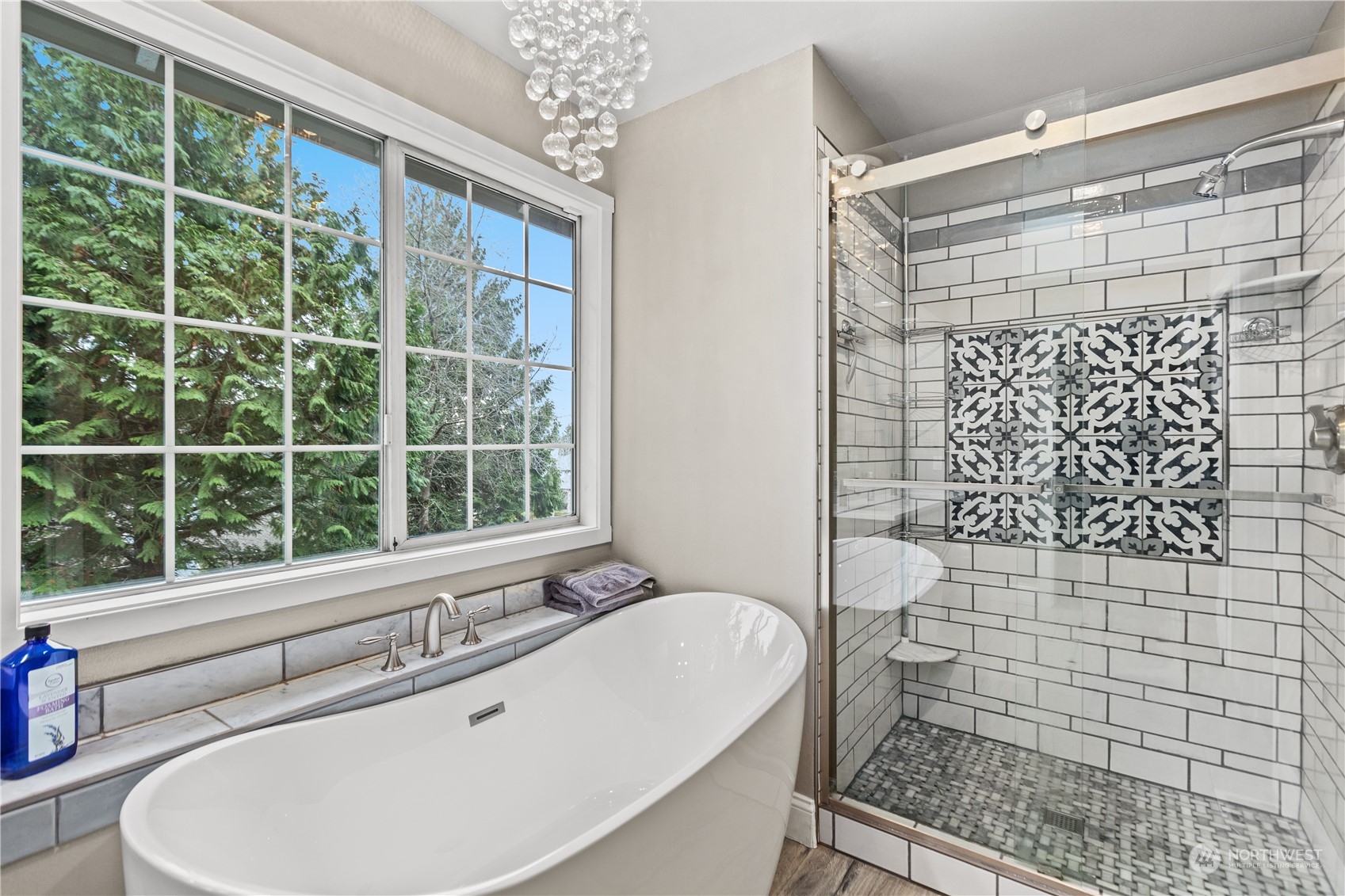 10411 Northeast 152nd Place Bothell, WA 98011 - Photo 28 of 38 a bathroom with a bathtub and next to a window
