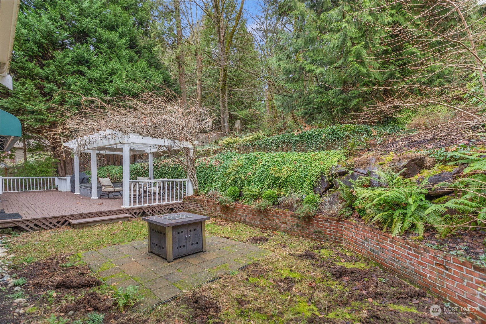 10411 Northeast 152nd Place Bothell, WA 98011 - Photo 35 of 38 a view of a house with backyard and sitting area