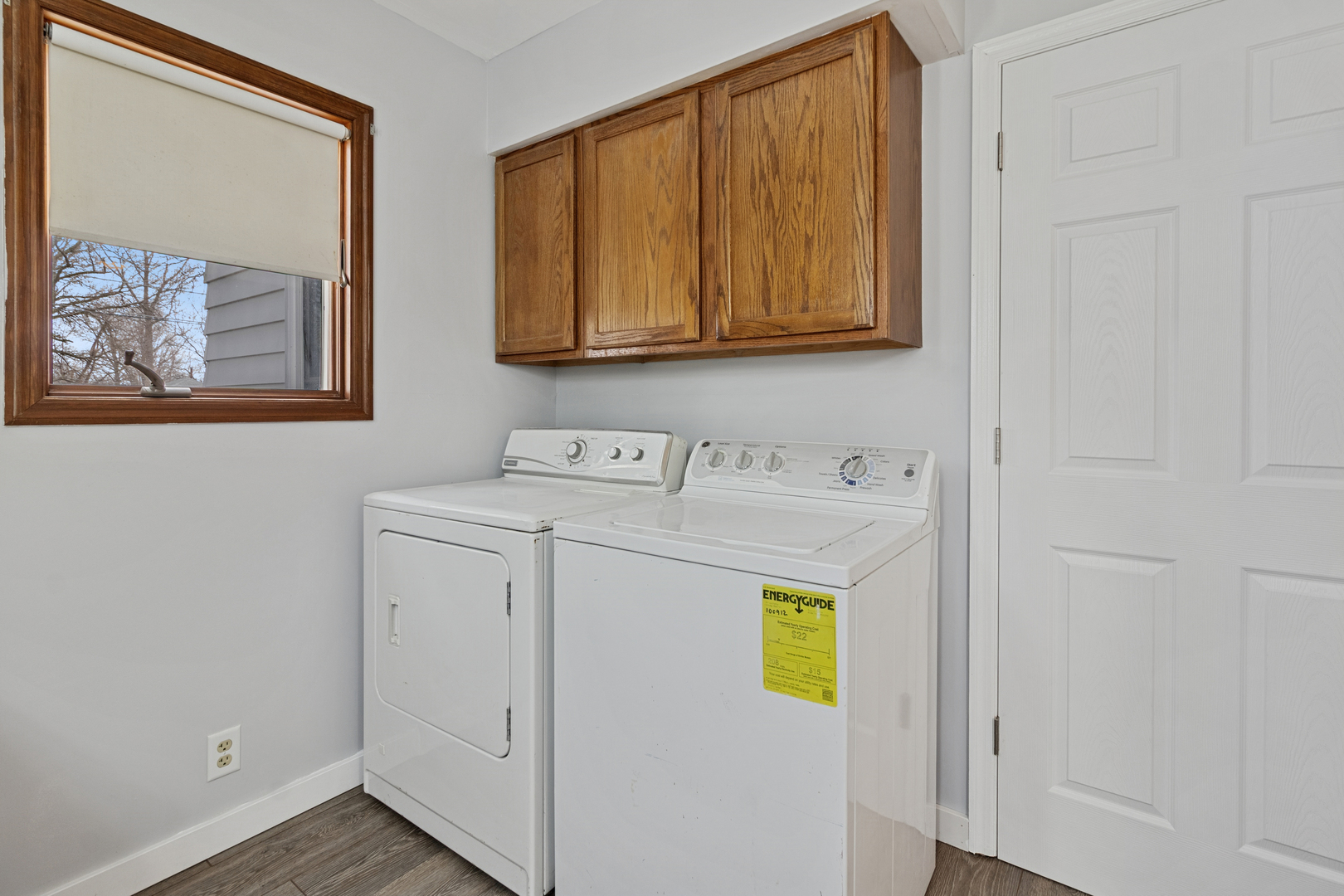 139 Elm Street DeKalb, IL 60115 - Photo 11 of 20 a utility room with dryer and washer