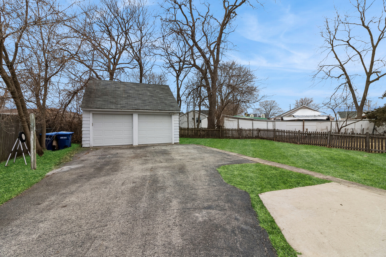 139 Elm Street DeKalb, IL 60115 - Photo 18 of 20 a front view of house with yard and trees