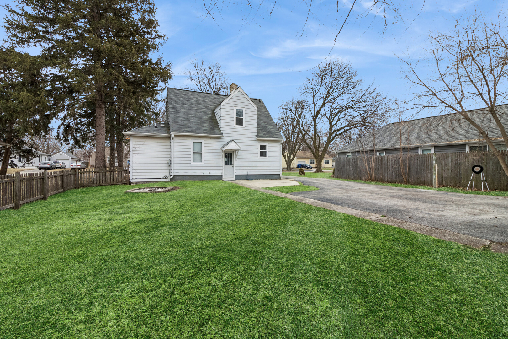 139 Elm Street DeKalb, IL 60115 - Photo 19 of 20 a front view of house with yard and green space