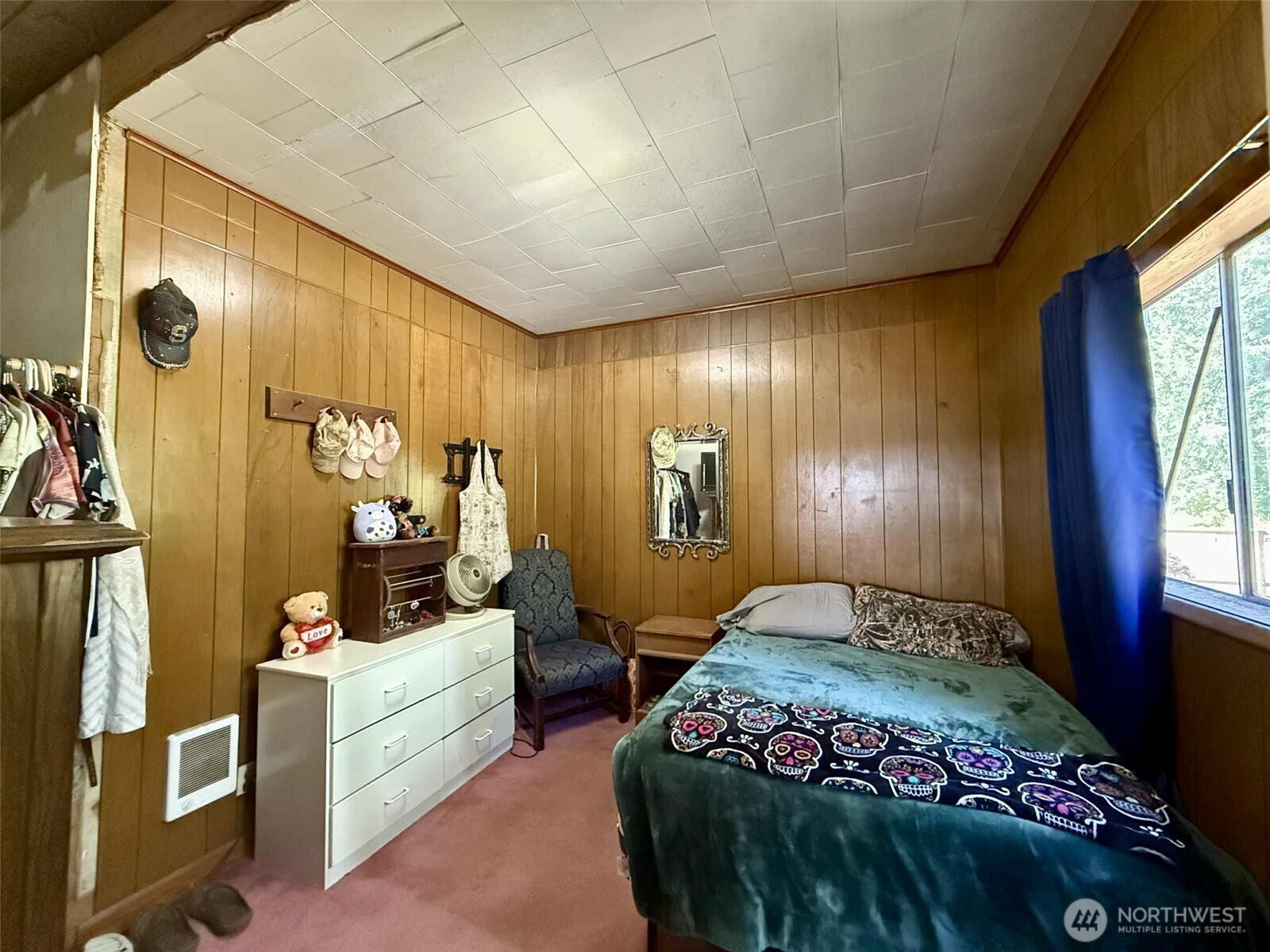15 Heise Road South Elma, WA 98541 - Photo 14 of 40 a bedroom with a bed and wooden floor