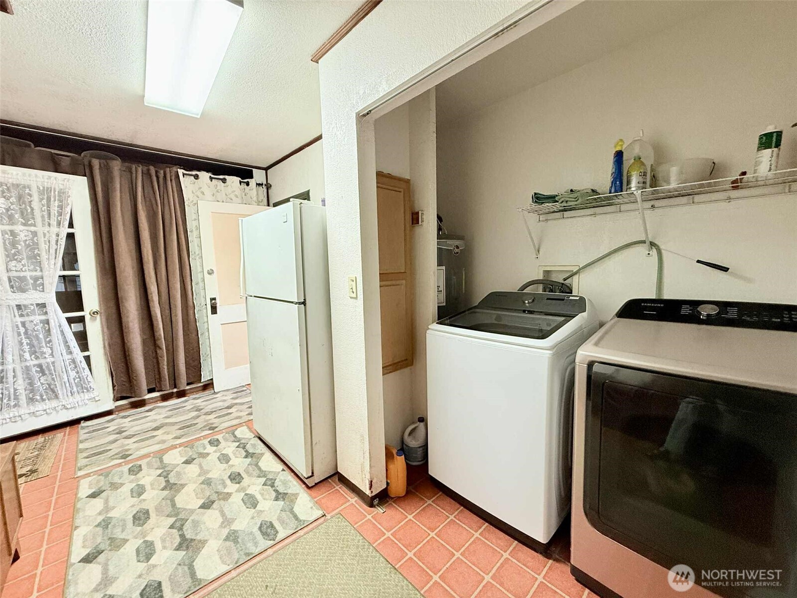 15 Heise Road South Elma, WA 98541 - Photo 20 of 40 a view of a storage and utility room with a sink